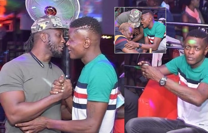 Bebe Cool and Chameleone share a light moment at Fame Lounge in Kampala