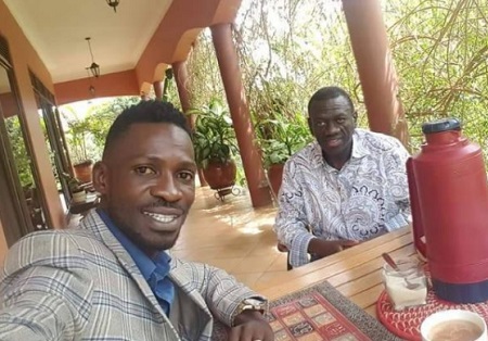 Bobi Wine takes a selfie of him and Kizza Besigye