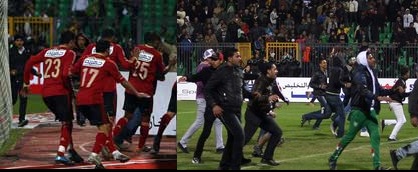 Al-Masri players being evacuated as supporters of Al-Ahly take over the pitch