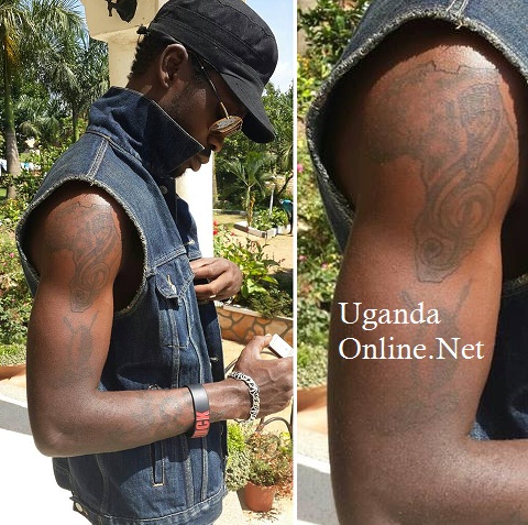 Bobi Wine showing off his tats