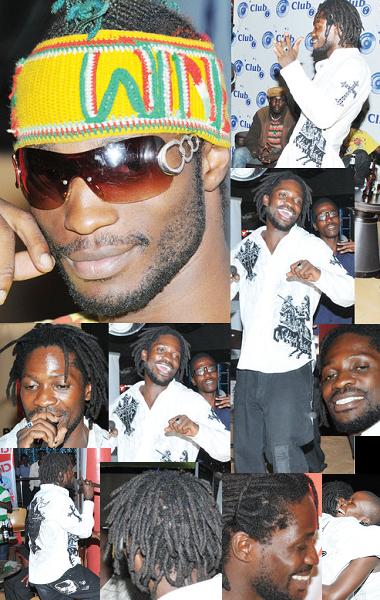 Bobi Wine entertaining fans as his brother looks on