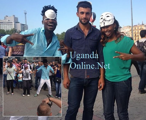 Bobi Wine and Barbie pose with a 'fan' at Taksim Square