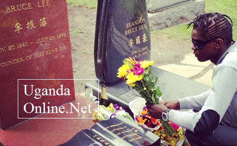 Jose Chameleone at Bruce Lee's grave site in Seattle