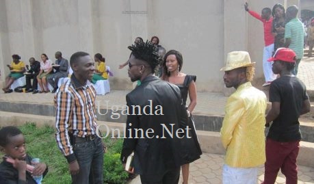 Pastor Bugembe and Bobi Wine chatting outside the church