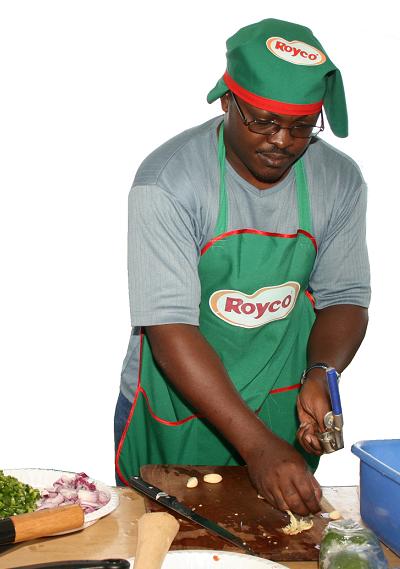 Mark Kaheru trying out his cooking skills