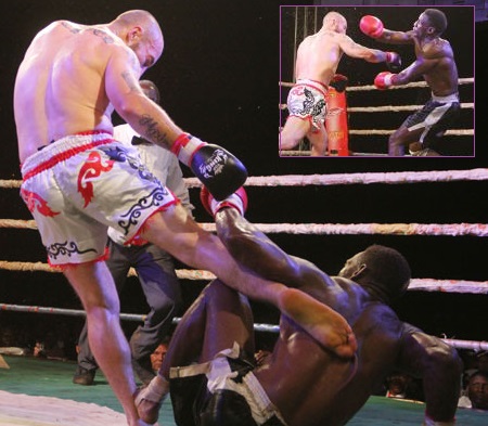 Richard Abraham kicks Golola who was trying to get up from the canvas