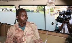 Thomas Kwoyelo in a military ambulance in Entebbe
