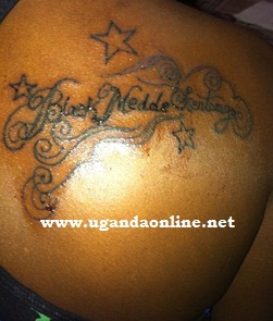 Bad Black tattos Meddie's name on her back