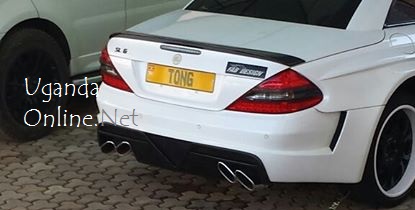 The Merc parked at his home with Tong Plates