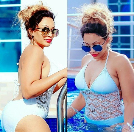 Zari shows off a toned body in this white swimming costume